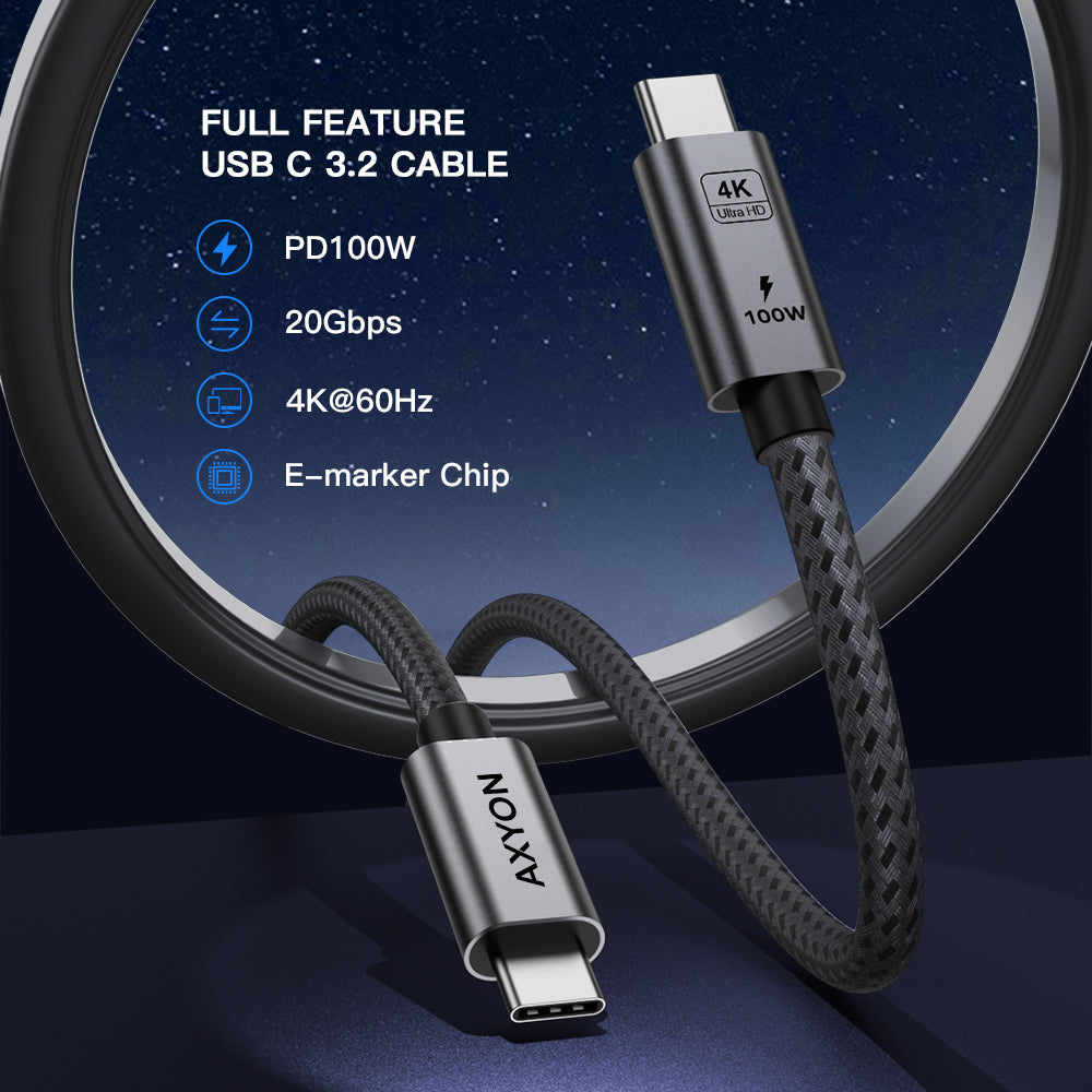 Technical diagram of the AXYON flagship 100W cable showing the inner 22 AWG tinned copper power lines, aramid fiber core, ground pins, aluminum shielding mesh, and Cypress E-Marker logic controller