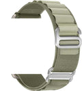 Green watch strap with silver buckle on a white background