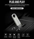 USB flash drive being inserted into a USB port with compatibility text and icons on a black background.