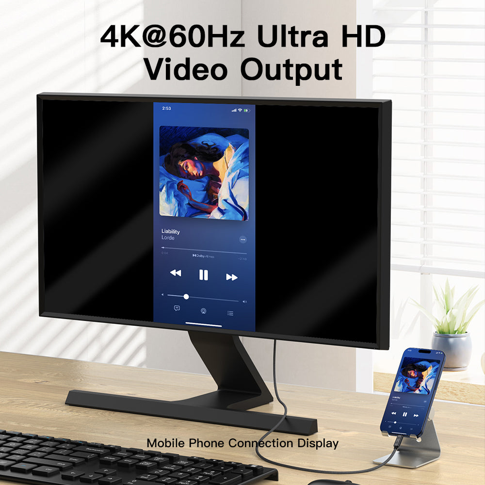 Monitor displaying a smartphone screen with 4K@60Hz Ultra HD video output text.