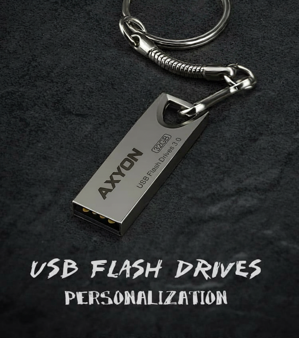 USB flash drive keychain with 'AXYON' branding on a dark background