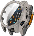 A close-up of a rugged silver smartwatch with a clear protective lens overlay, dark display screen, and orange accent details on the side.