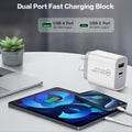 AXYON 25W dual-port fast charging block with USB-A QC18W and USB-C PD 25W ports charging tablet and phone on desk
