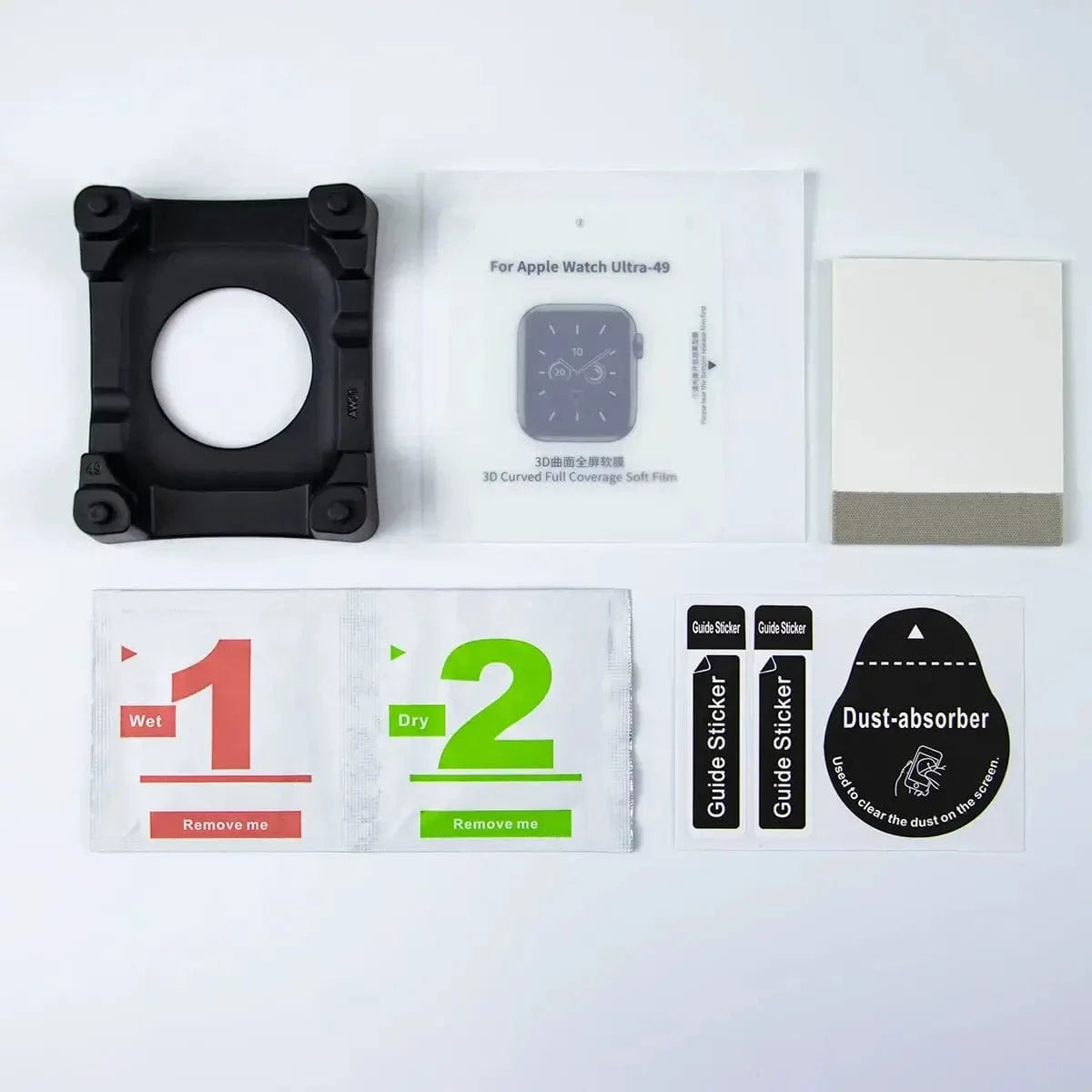 Collection of items including a black case, watch face display, cleaning kit, and stickers on a white background