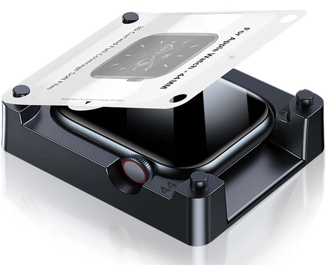 Close-up of a black electronic device with metallic components on a white background