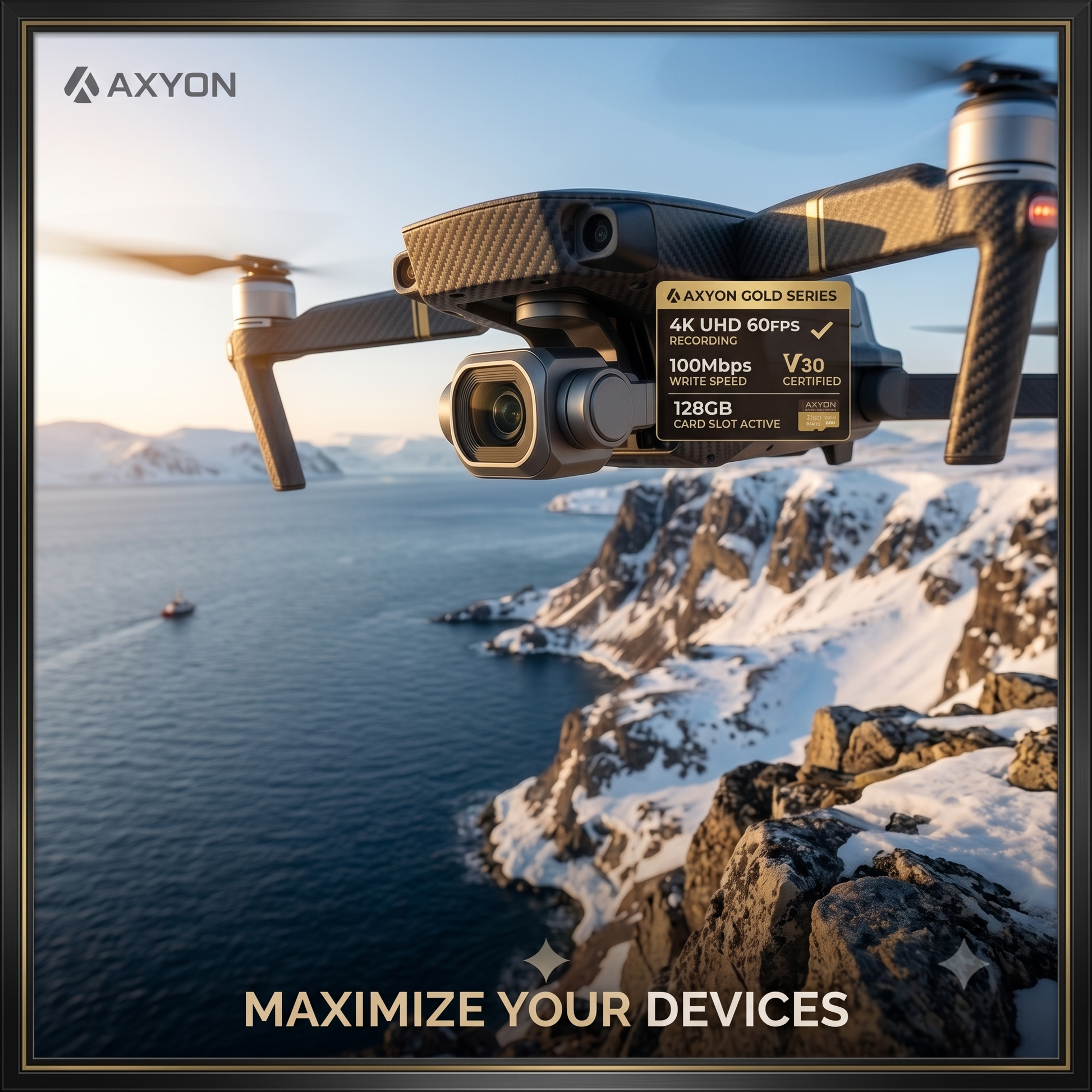 A carbon-fiber quadcopter drone flying over a snowy coastal landscape, with a branded memory card attached to its camera. The card reads 'AXYON GOLD SERIES 4K UHD 60IPS 100Mbps V30 CERTIFIED 128GB CARD SLAT ACTIVE'.