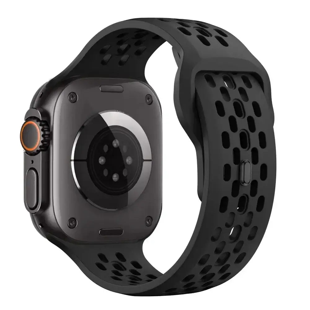 Black smartwatch with a perforated black band on a white background