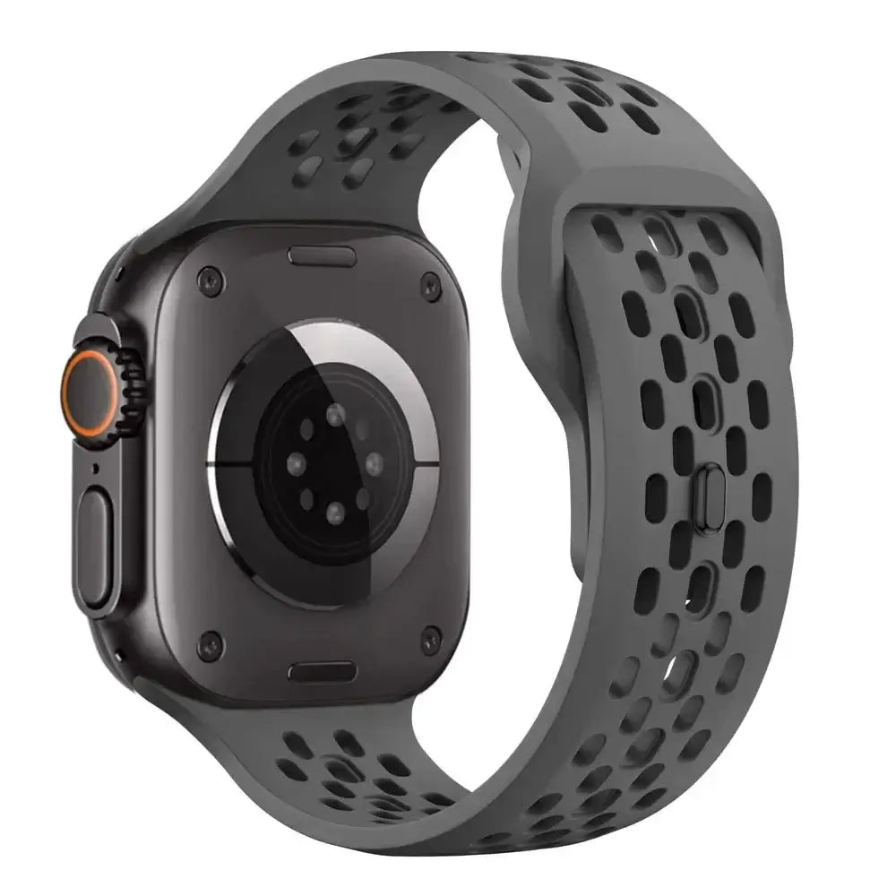 Smartwatch with a gray perforated band on a white background