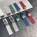 Set of colorful watch straps on a metallic surface