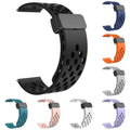 Black perforated watch band with additional colors on a white background