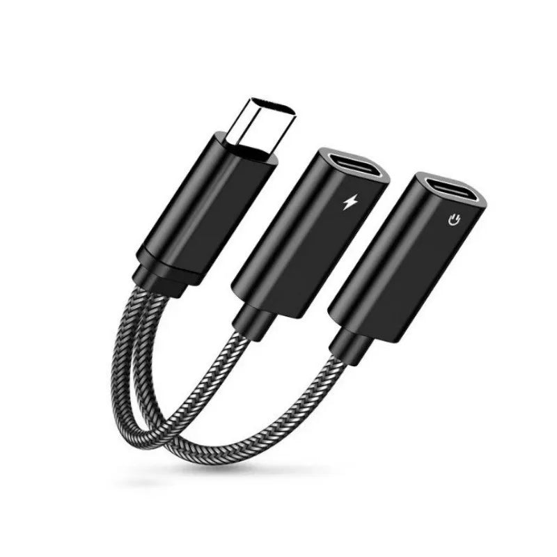 Black USB-C adapter with multiple connectors on a white background