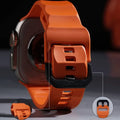Close-up of an orange smartwatch with a detailed view of its back and charging port.