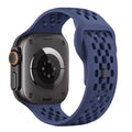 Smartwatch with a blue perforated band on a white background