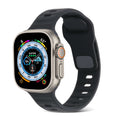 Black AXYON® Sport Silicone Band for Apple Watch with pin‑and‑tuck closure.