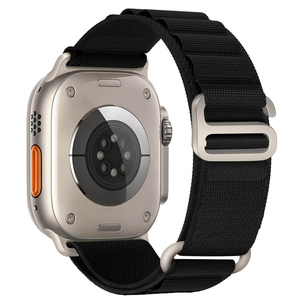Black Alpine Loop‑Style Band on Apple Watch – Rugged woven nylon strap with stainless steel G‑hook buckle, black colour.