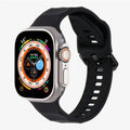 AXYON Wave silicone sport band in black for Apple Watch 38mm - 49 mm classic, sweat‑resistant, and secure buckle closure.