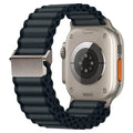 Dark grey wide corrugated nylon off‑road sports strap for Apple Watch with silver buckle.