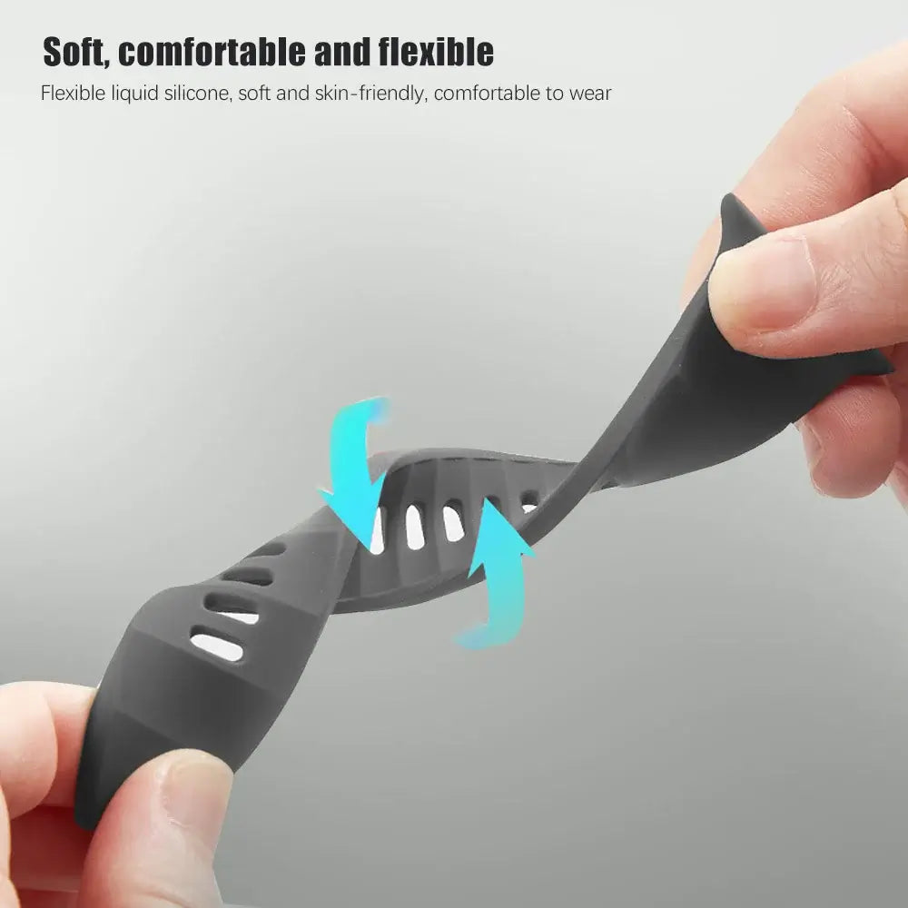 Gray silicone band with text highlighting its soft, comfortable, and flexible properties.