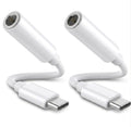 Two white USB-C adapters on a white background
