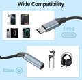 Cable with Type-C and 3.5mm connectors on a light blue background