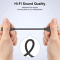 Hands holding a black audio cable with 'Hi-Fi Sound Quality' text on a light gray background