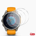 Smartwatch with orange band and three transparent screen protectors on a white background